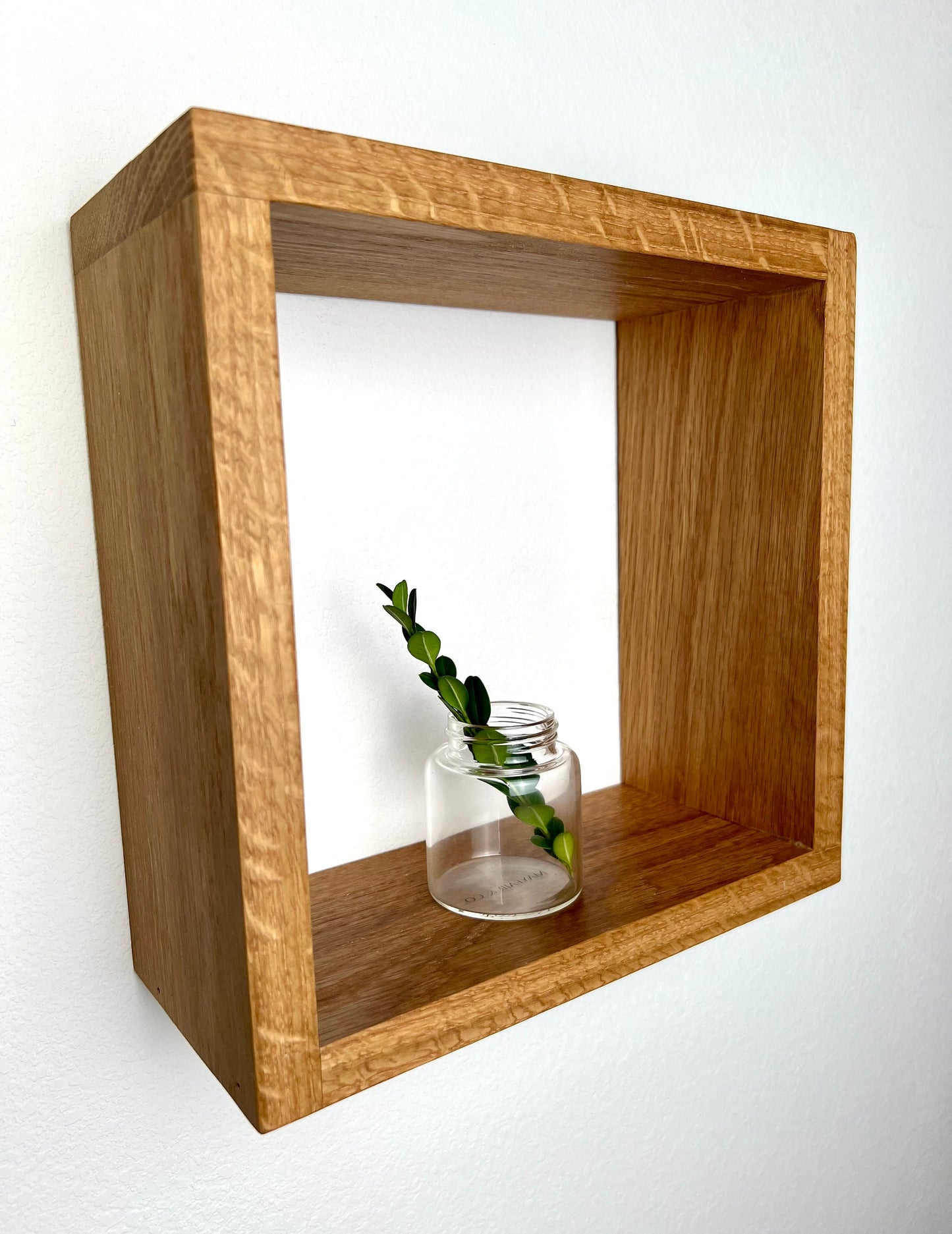 Hardwood cube pictured in White Oak
